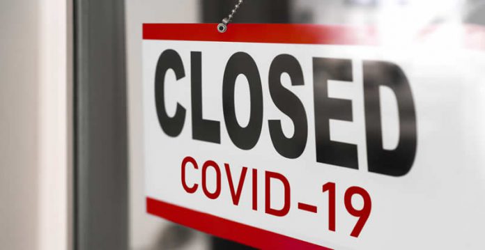 closed business covid sign closed business covid sign