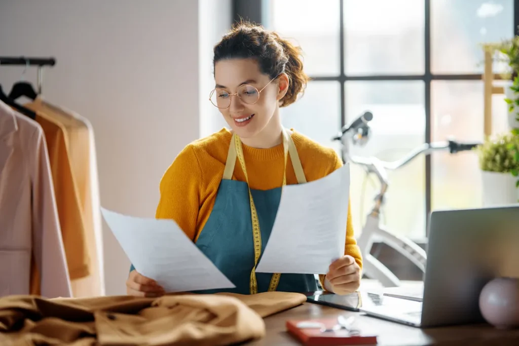 Small business owner reviewing master business license registration documents in Ontario