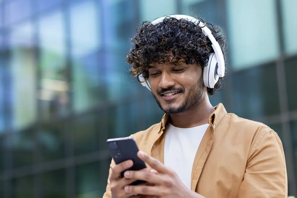 Entrepreneur listening to a business podcast