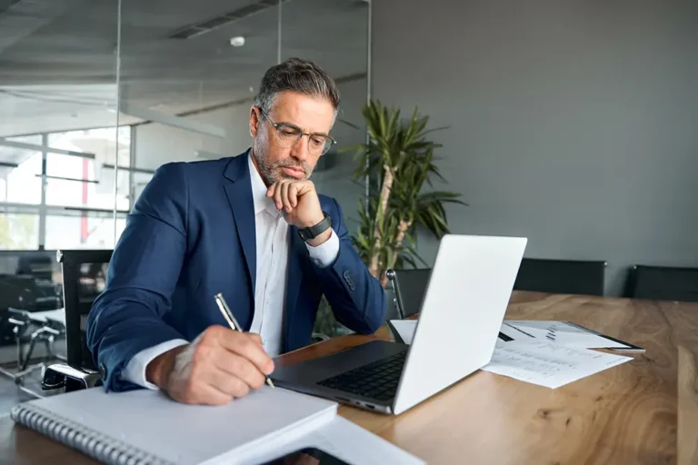 corporate employee looking over legal documents