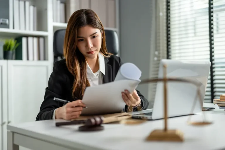 businesswoman filing articles of revival
