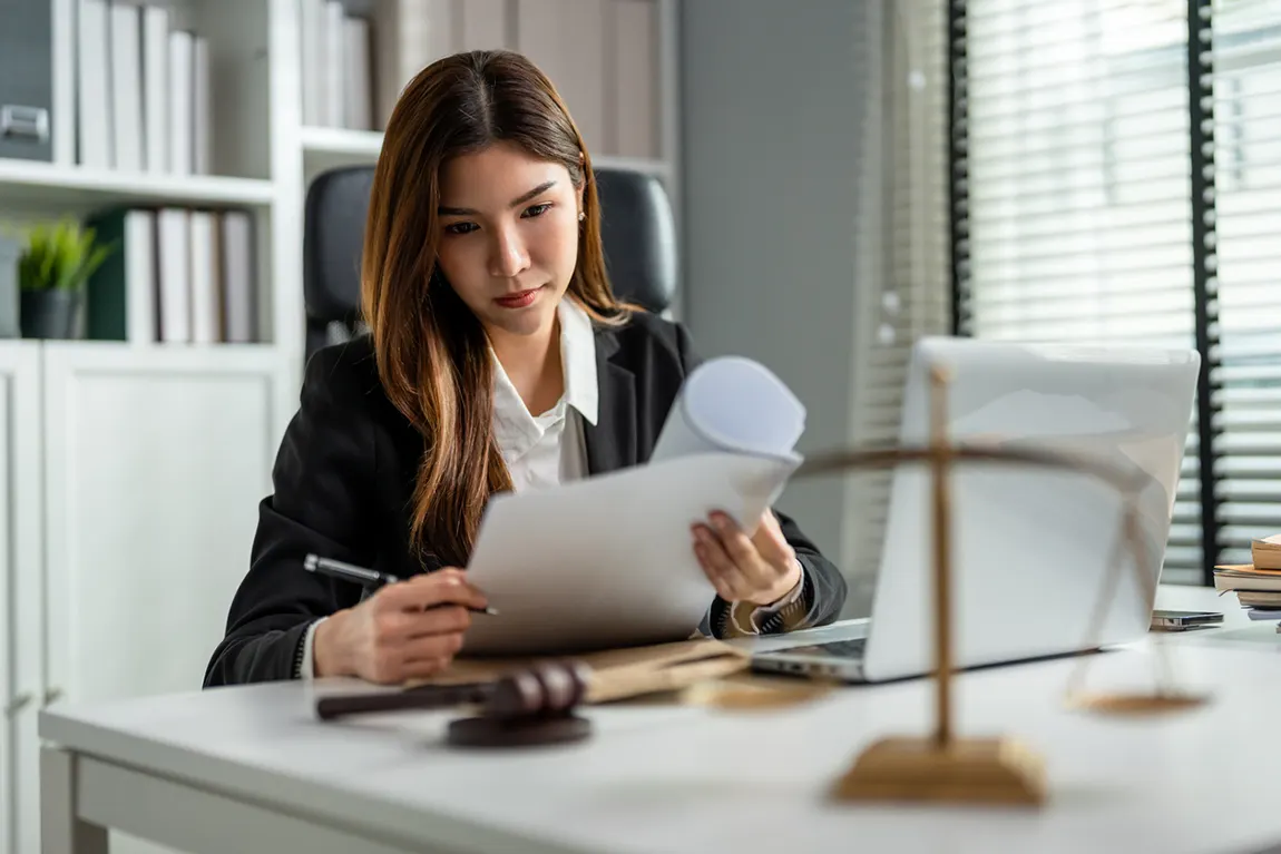 businesswoman filing articles of revival
