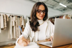 Business owner verifying corporation status to set up a Stripe Canada account using a Corporate Profile Report