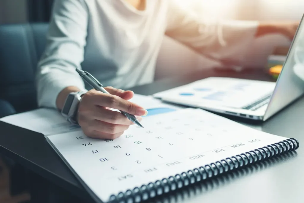 Business owner scheduling annual return filing for corporation.