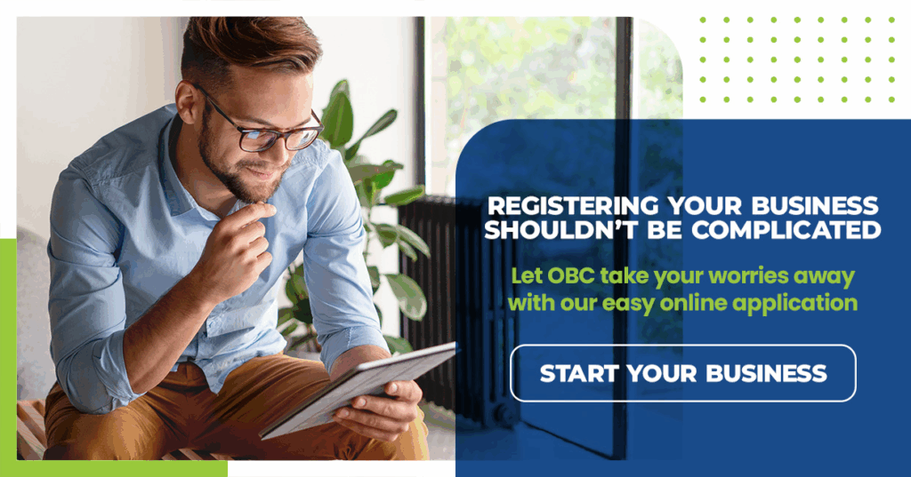 Smiling entrepreneur reads a tablet beside banner: “Registering your business shouldn’t be complicated — Start your business.”