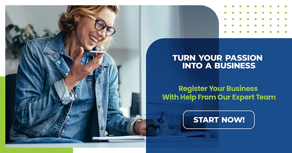 Woman smiling at desk with phone, beside "Turn Your Passion Into a Business" registration CTA banner
