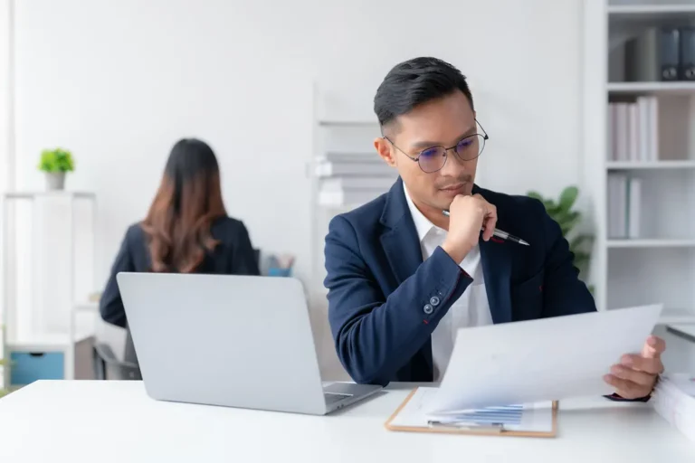 Corporate officer reviewing fiduciary duties and governance responsibilities for board of directors
