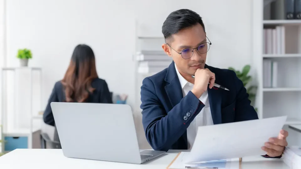 Corporate officer reviewing fiduciary duties and governance responsibilities for board of directors