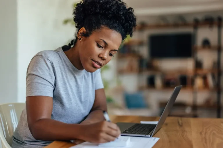 Small business owner completing Ontario business registration online at home