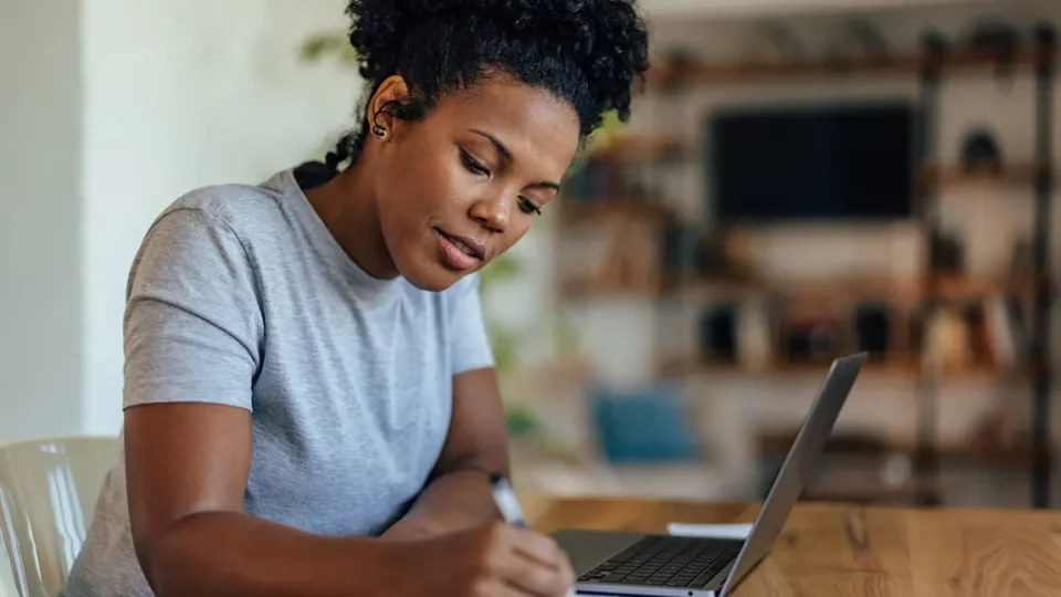 Small business owner completing Ontario business registration online at home
